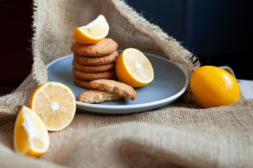 lemon cookies made at home, citrus baking deliciously lies on a table in a fabric, a recipe for fruit baking