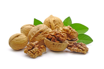 Walnuts isolated on white background. Selective focus.