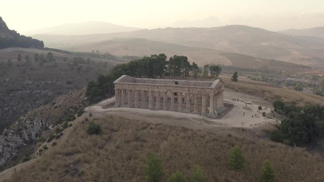 Aerial view of temple of Olympian is also known as the Columns of the Olympian Zeus. Action. Ancient temple standing on the high hill in Athens in Greece.