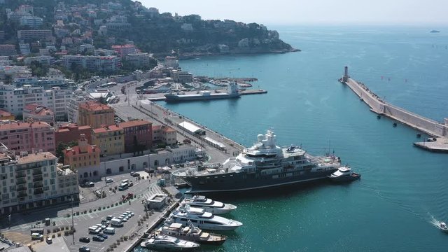 Aerial view of luxury yachts near the coastline. Action. The popular destination of Villefranche-sur-Mer, near Nice, on the French Riviera.