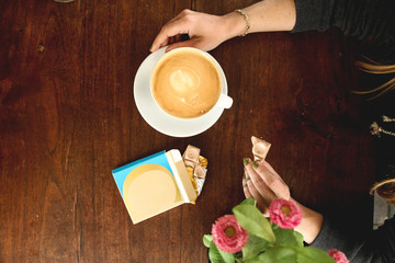 hand holding chocolate 