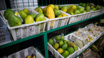 Papaya and mango in a mini market box. Easy cultivation process with good business value