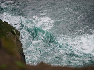 waves crashing on rocks