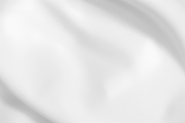 Abstract white fabric texture background. Cloth soft wave. Creases of satin, silk, and cotton.