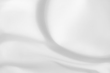 Abstract white fabric texture background. Cloth soft wave. Creases of satin, silk, and cotton.