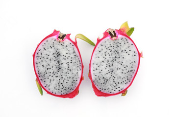 half slices of dragon fruit on white background 