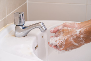 Hand washing with soap foam