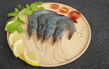 Raw shrimp for cooking on plate with vegetable for health care food 