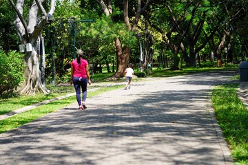 Fototapeta premium woman walking in park