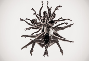 The group of modern ballet dancers like a tree. Contemporary art ballet. Young flexible athletic...