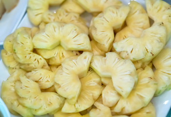 Sliced pineapple as dessert in the party