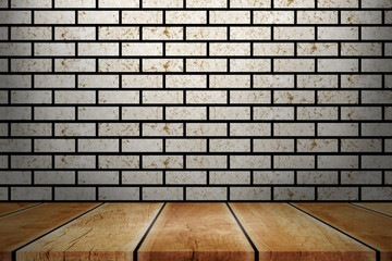 Wood table top with concrete wall background. Used for product placement or montage.	