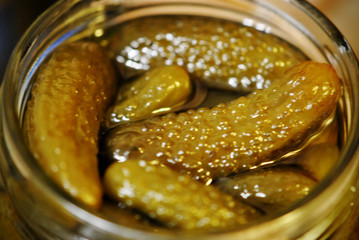 Sweet pickled gherkins in a jar.