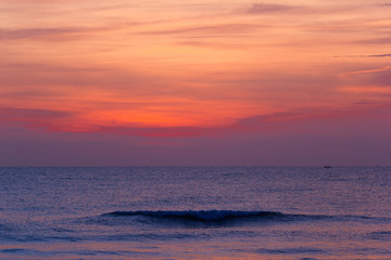 landscape view the beautiful silhouette last little bit of the sunrise light shoots of the sea
