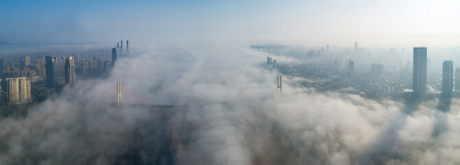 A City shrouded in fog in the morning, Nanchang, China 