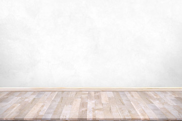 Wood table top with concrete wall background. Used for product placement or montage.	