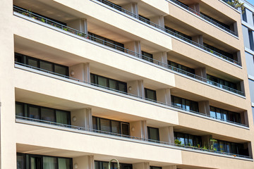Facade of a modern apartment house with large balconies