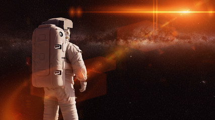 standing astronaut looking into empty space  © dottedyeti