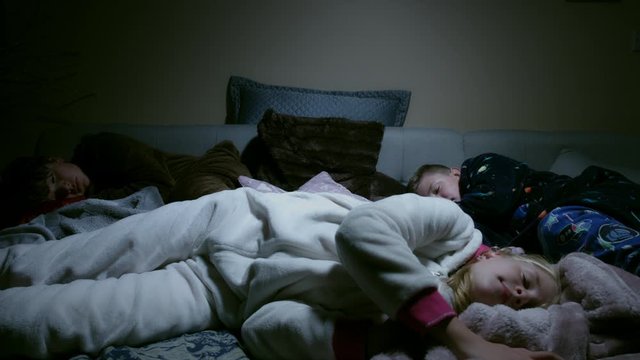 4k Dolly Shot of Children Sleeping in one Bed