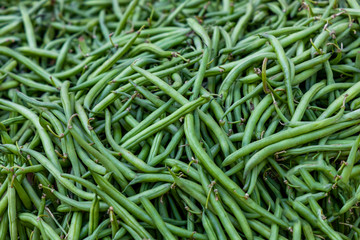 .Green beans. Natural green background.