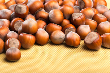 close up of hazelnuts on table .