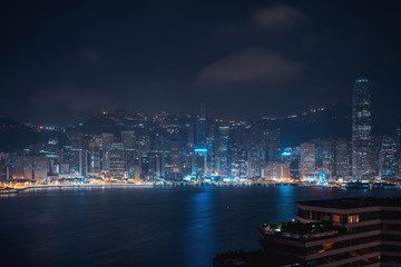 Plakat Cityscape and skyline at Victoria Harbour in Hong Kong city at Night