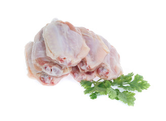 Raw chicken  on cutting board on white background