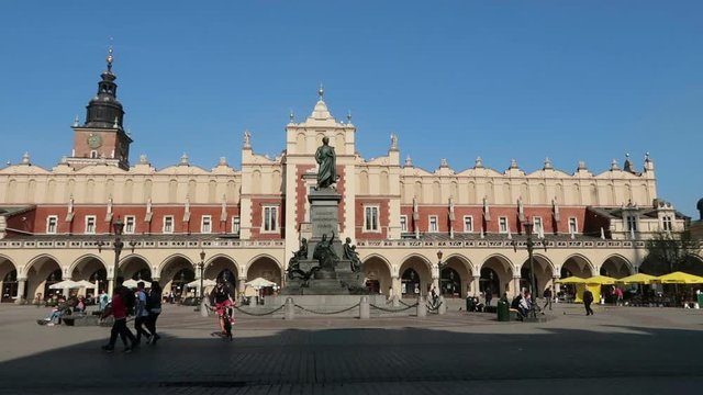 Krakow, Poland, Adam Mickiewicz Monument and Cloth Hall in background