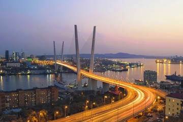 Night Vladivostok panorama. Golden bridge. Golden horn bay. Primorsky Krai, far East, Russia.