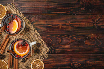 Christmas composition with  hot mulled wine in rustic cup