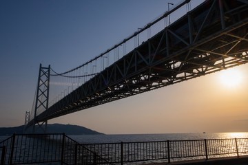 Sunset at Akashi Kaikyo bridge at Kobe port, Japan