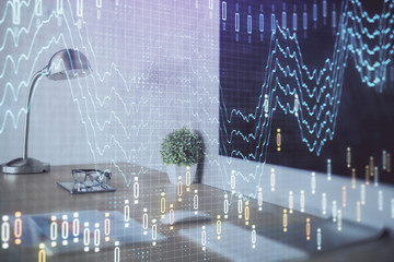 Stock market graph on background with desk and personal computer. Double exposure. Concept of financial analysis.