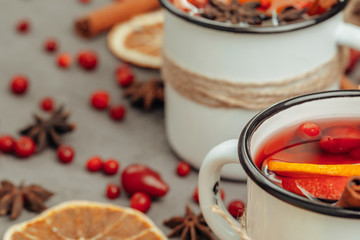Christmas composition with  hot mulled wine in rustic cup