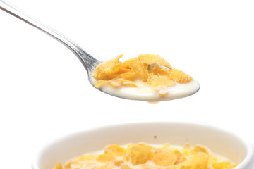 Cornflakes on bowl  isolated on white background