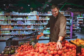 man do shopping in grocery store
