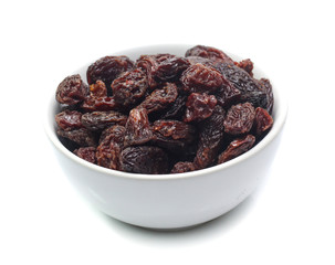 Organic dried Raisins isolated on white background
