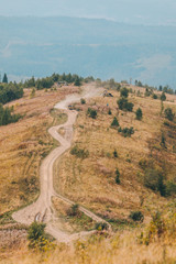 off road car travel by mountains peak autumn season