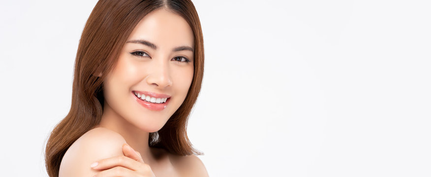 Smiling Asian woman for beauty and skin care concepts