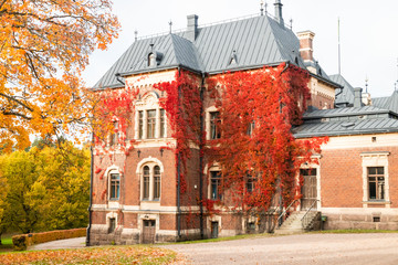 Fototapeta na wymiar Loviisa, Finland - 7 October 2019: The gate of Manor House Malmgard.