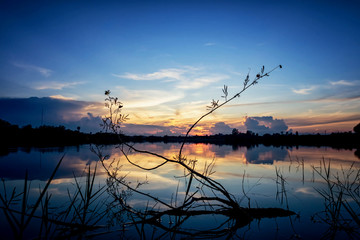 Beautiful sunset sky with reflection on the lake