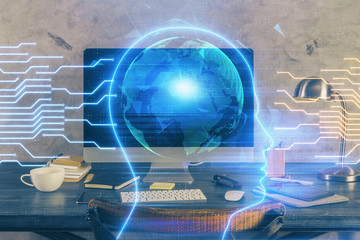 Double exposure of table with computer and brain hologram. Data innovation concept.