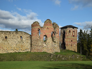 Fototapeta na wymiar picture with old medieval castle ruins, colorful autumn day