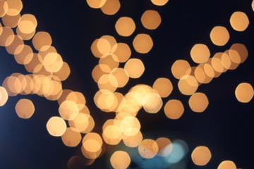 Blurry image of colorful bokeh at a decorating light during festival.
