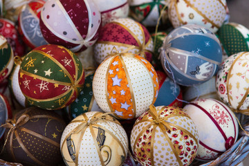 Christmas souvenirs on the counter in Europe, Painted glass Christmas balls with fairy tales.