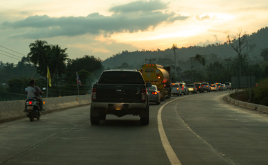Fototapeta na wymiar Traffic jams on the dusty road