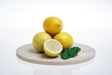 Yellow lemons on white background, isolated
