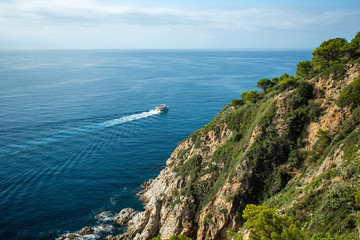 white boat sails Mediterranean sea