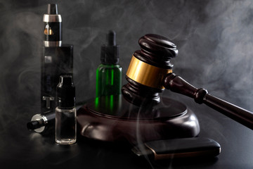 Legal act to restrict vaping, outlaw smoking electronic cigarettes and vape ban legislation...