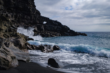 Playa del Paso volcanic coastal path in Timanfaja National park near El Golfo