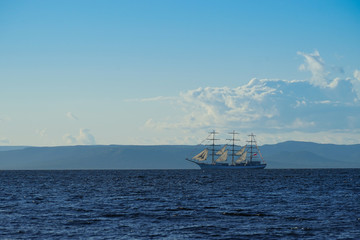 Vintage white sailboat on the background of the seascape.